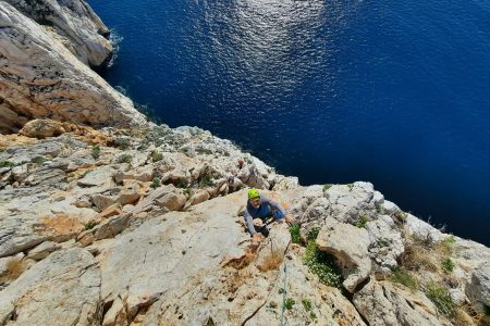 From Nebida: climbing the cliff of Masua